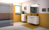 A clean bathroom featuring a modern shower and a sleek sink, designed for functionality and comfort.