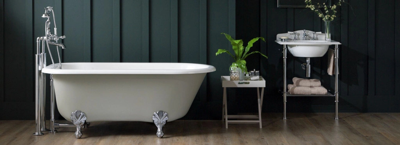 A bathroom scene featuring a bathtub, a stand, and a sink, showcasing a clean and organized space.